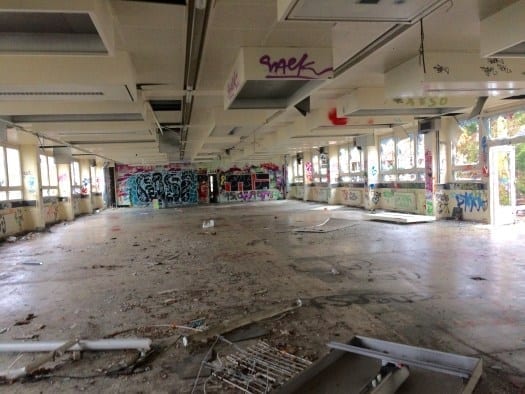 Lecture hall of the abandoned FU Berlin Anatomy Institute with remaining chairs, some fire-damaged, Dahlem Berlin
