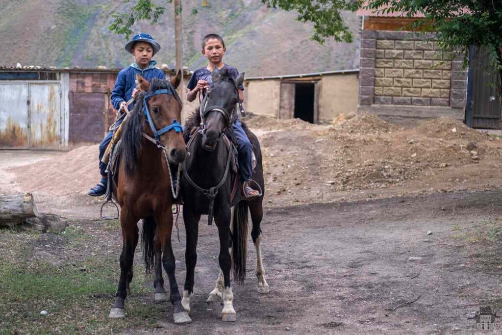 Children on horseback in Ming-Kush