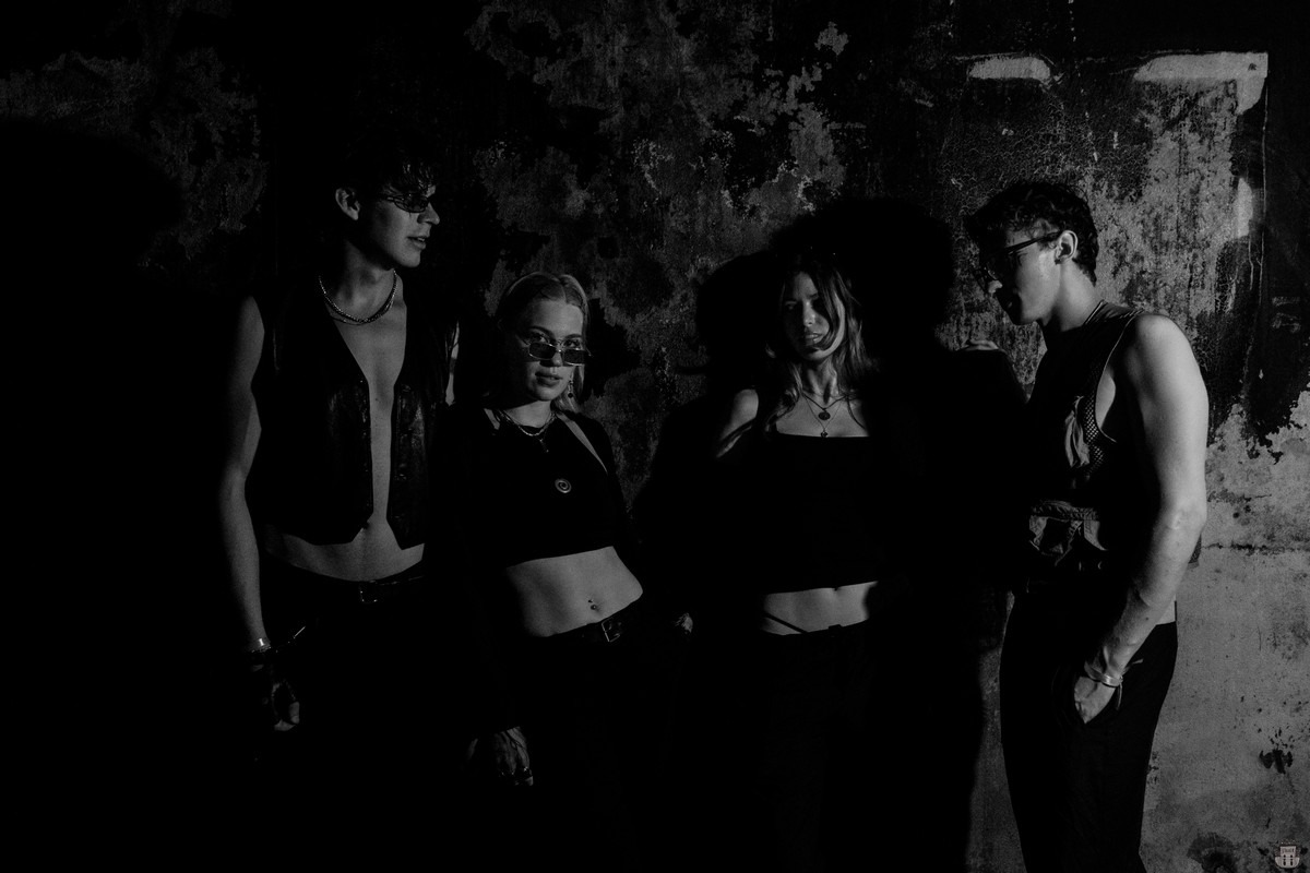 People posing in an abandoned bunker in Latvia